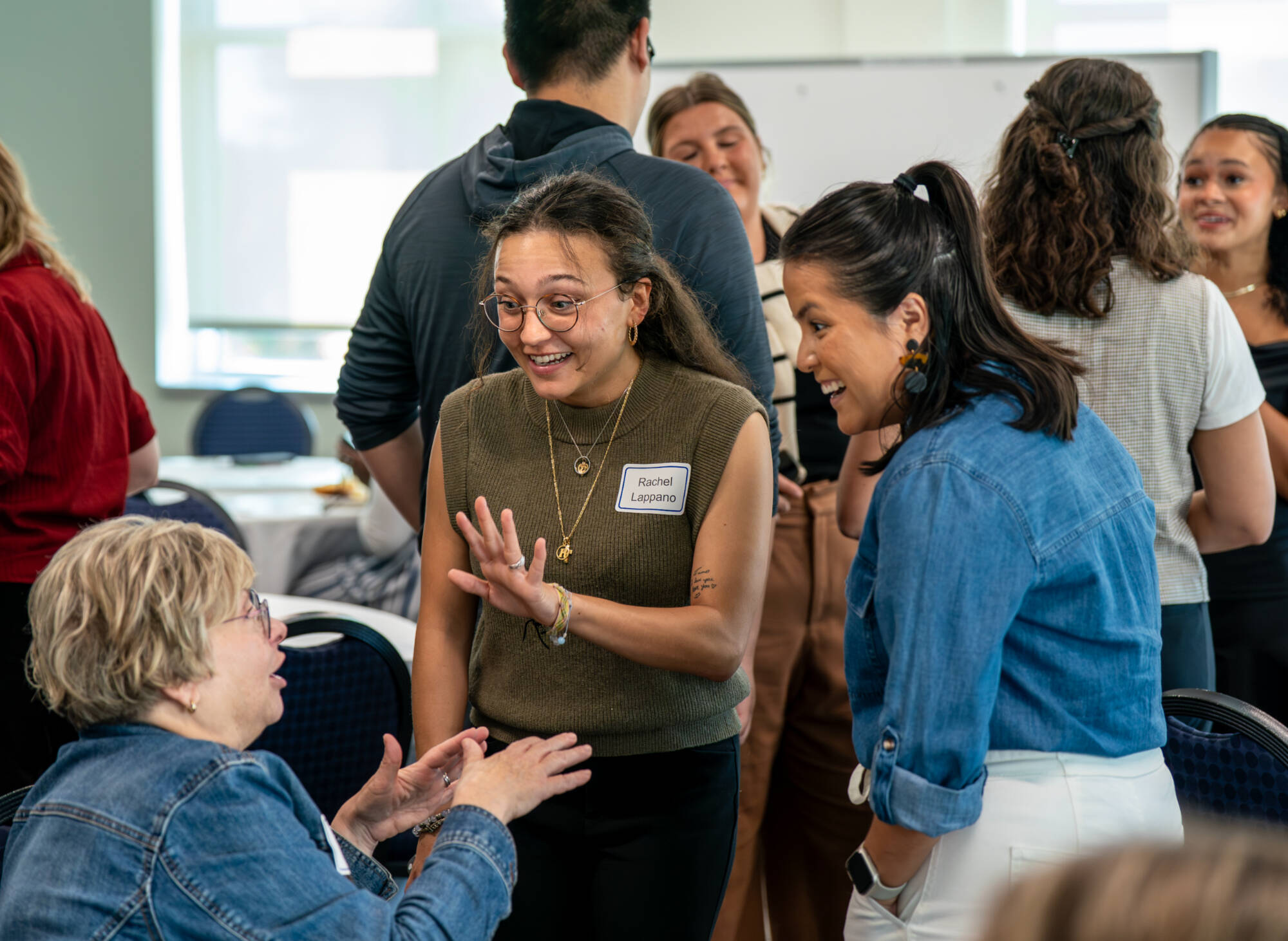 Students and Faculty having conversation